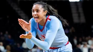 Karlyn Pickens celebrates during a high school basketball game before beginning her record-breaking softball career at Tennessee. Photo courtesy of The Jackson Sun