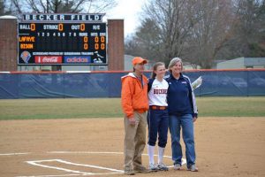 Jan Greenhawk (far right) with daughter Cassie, who played at Bucknell, has seen early recruiting used as a negative motivator by a committed athlete’s own coaches.